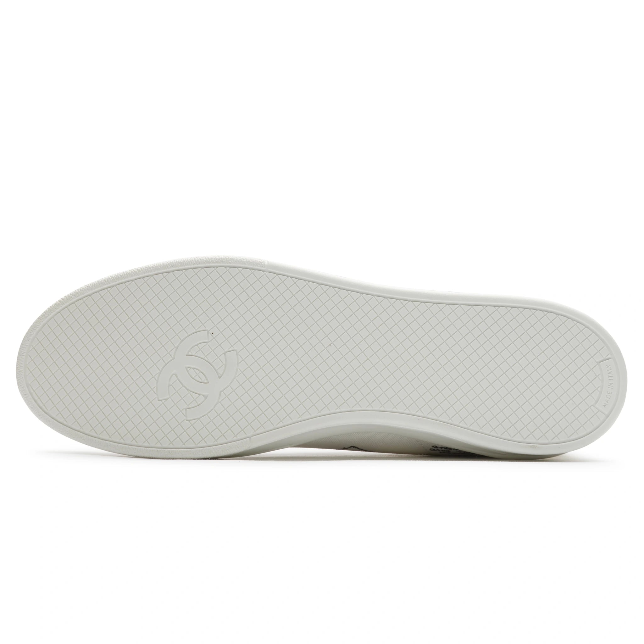 Sole view of Chanel x Pharrell White Canvas Sneaker - Preloved